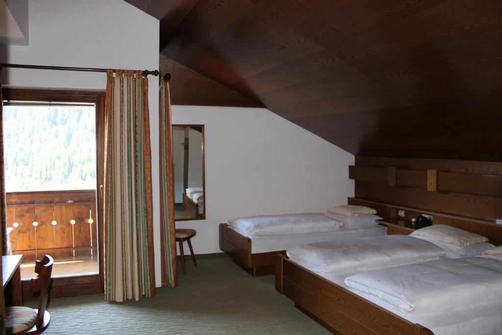Postel nebo postele na pokoji v ubytování Villa Luise