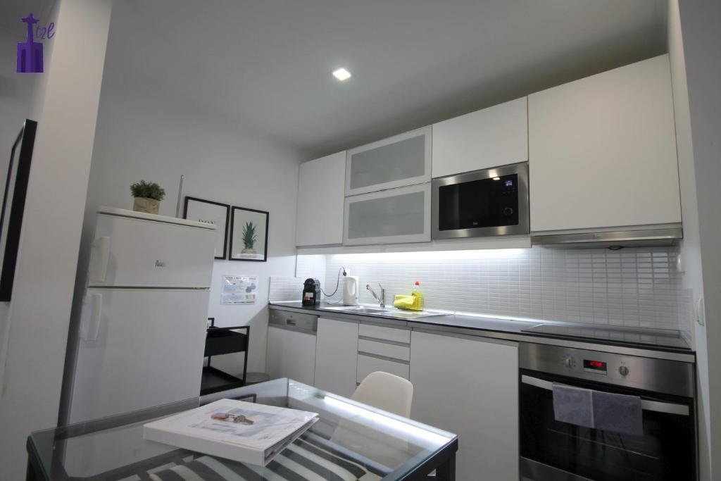 Kuchyň nebo kuchyňský kout v ubytování Lisbon North Apartment