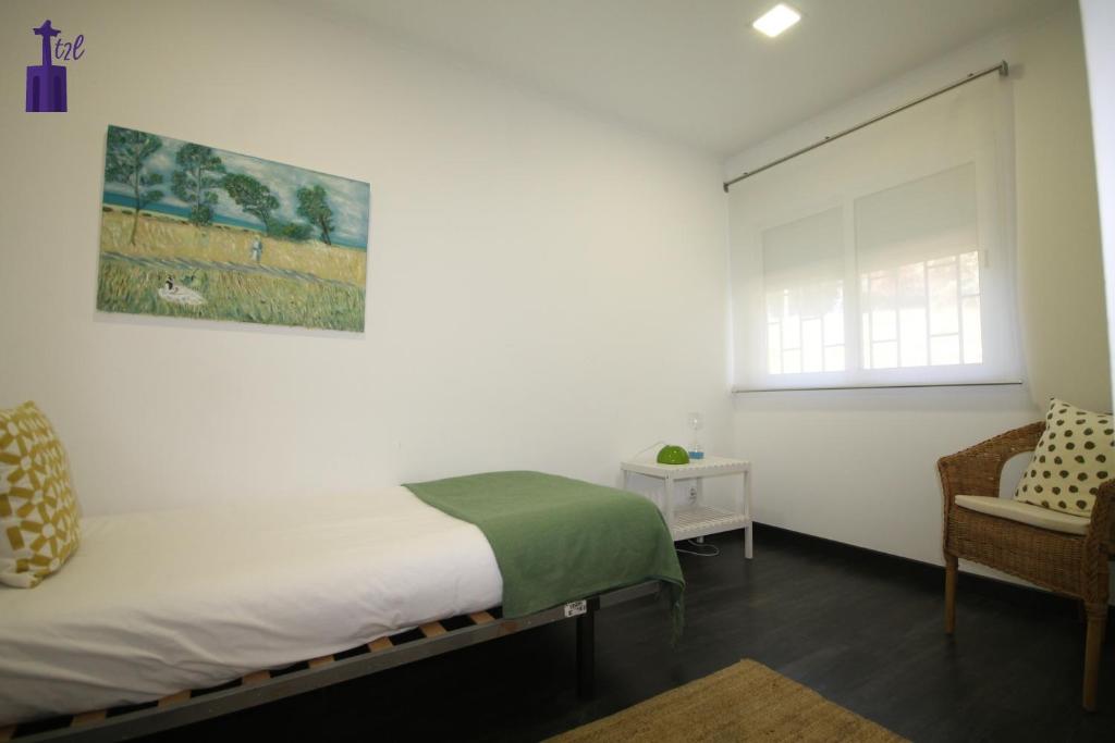 Postel nebo postele na pokoji v ubytování Lisbon North Apartment