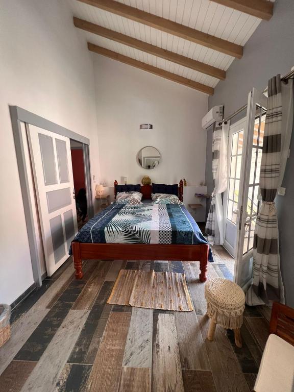 A bed or beds in a room at Bekeke