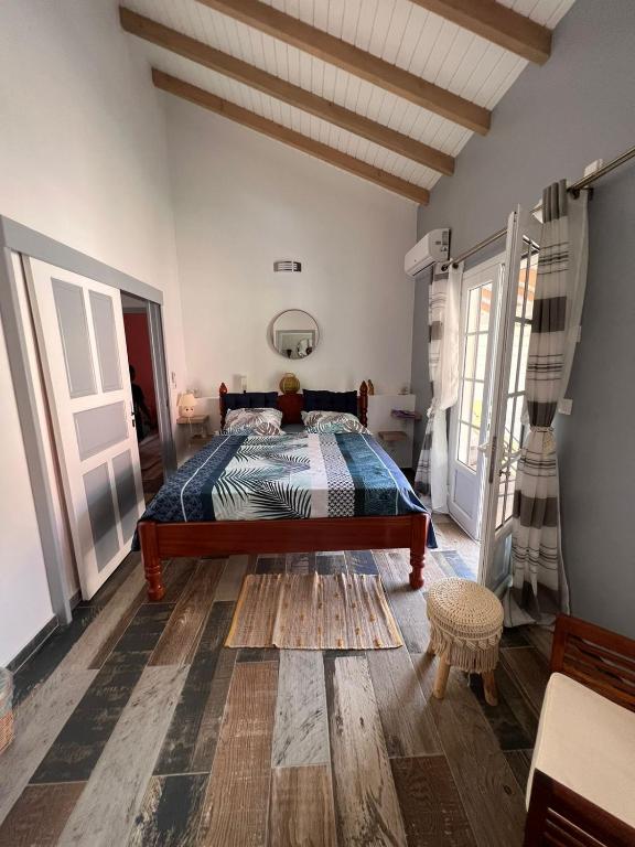 A bed or beds in a room at Bekeke
