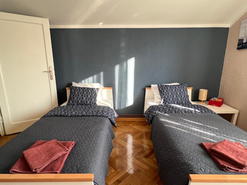 Postel nebo postele na pokoji v ubytování Apartman Stojanović