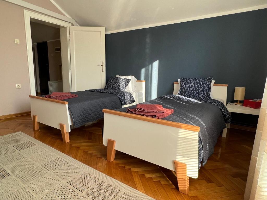 Postel nebo postele na pokoji v ubytování Apartman Stojanović