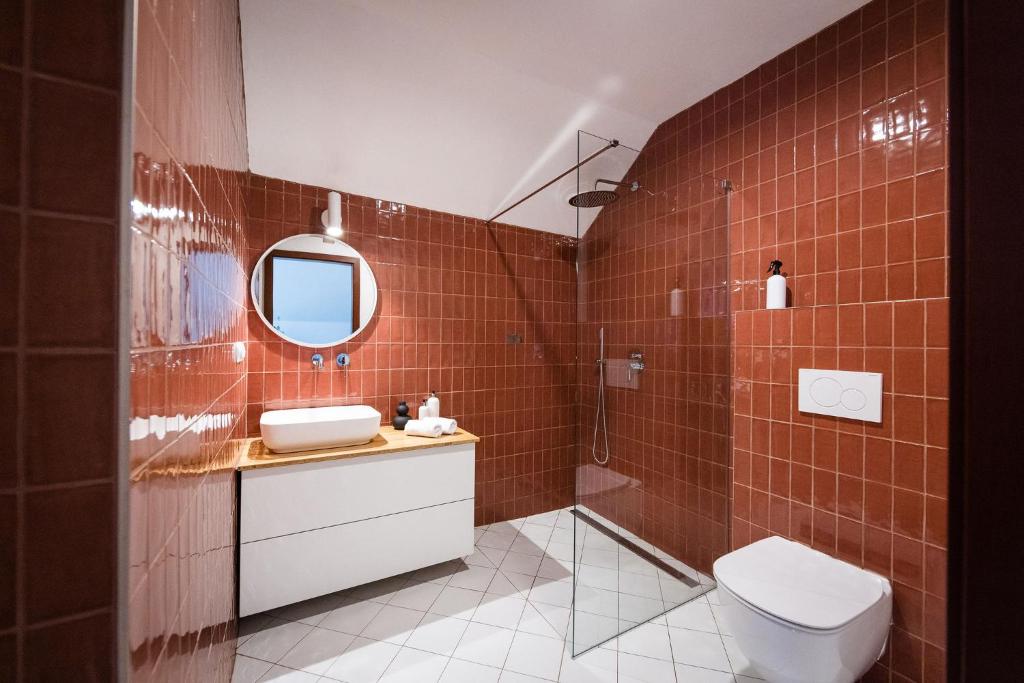 Koupelna v ubytování Resort po.spolu