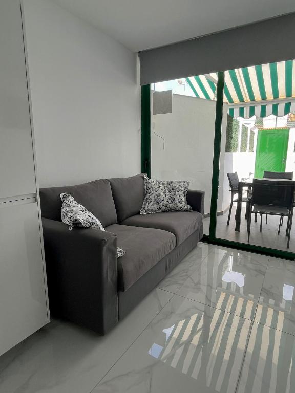 A seating area at Luxury bungalow Maspalomas Gran Canaria