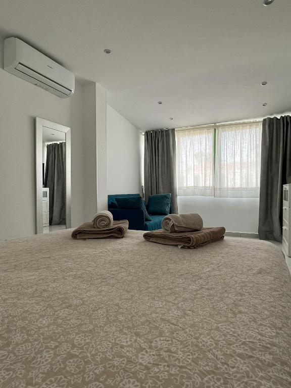 A seating area at Luxury bungalow Maspalomas Gran Canaria