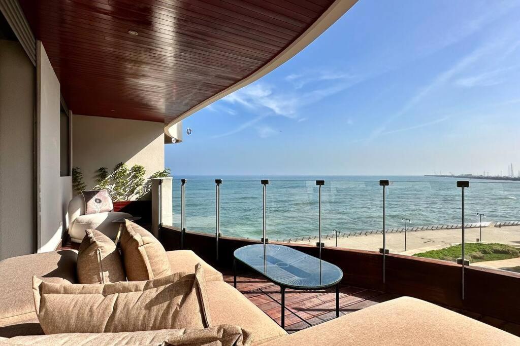 a living room with a view of the ocean at Marina State of Peace - Sea View in Casablanca