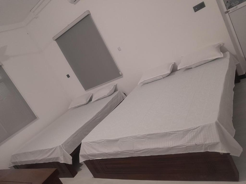 Postel nebo postele na pokoji v ubytování LIZI VILLA