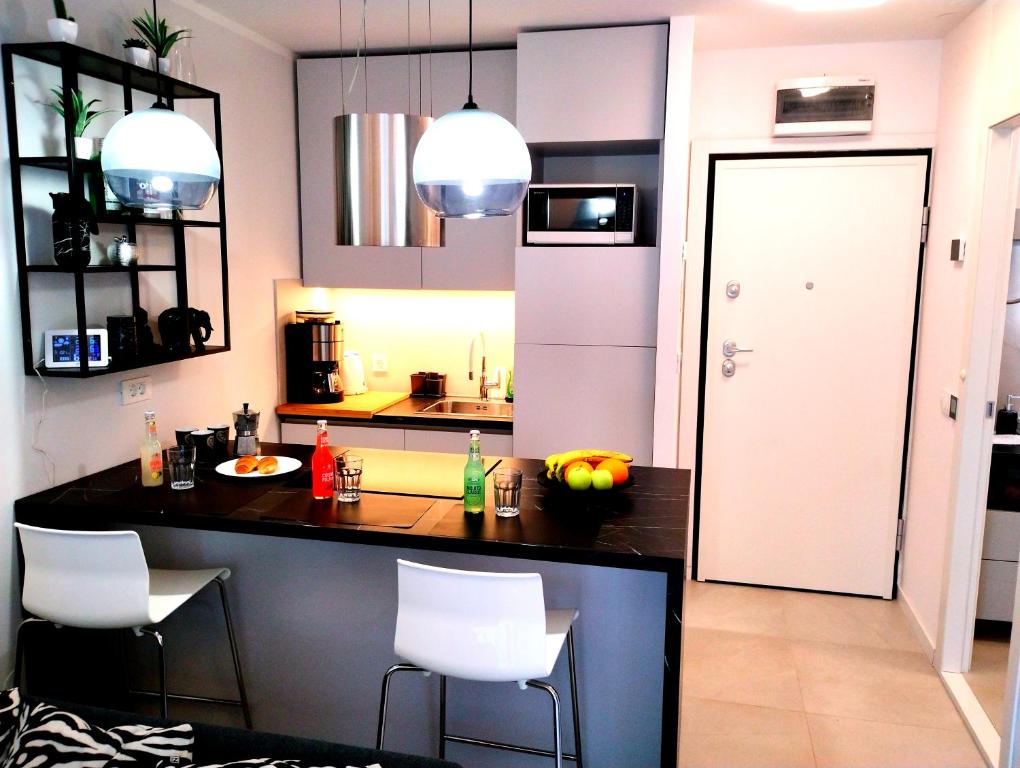 Kuchyň nebo kuchyňský kout v ubytování Premium Apartment Eden