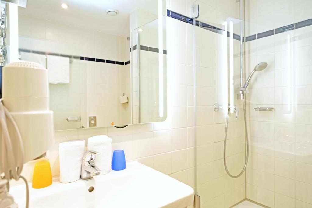 Koupelna v ubytování Hotel Römerstadt