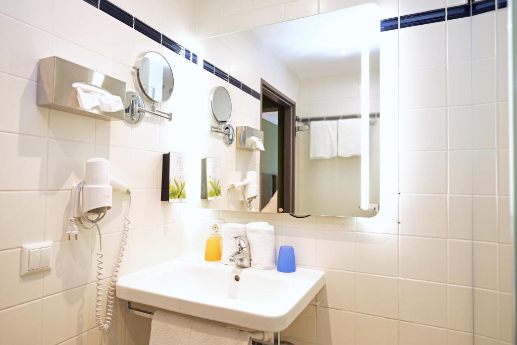 Koupelna v ubytování Hotel Römerstadt