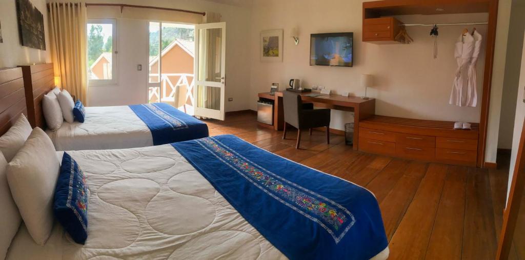 Postel nebo postele na pokoji v ubytování Aranwa Pueblito Encantado del Colca