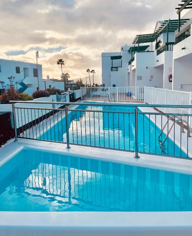 The swimming pool at or close to -MONTORIAN Apartments -LANZAROTE
