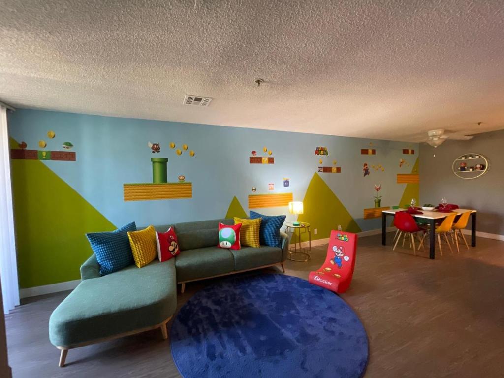 a living room with a couch and a table at Hollywood Apartment One Bedroom with Mario in Los Angeles