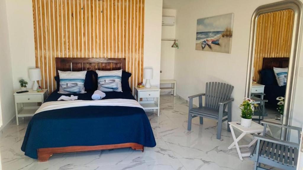 Postel nebo postele na pokoji v ubytování La Isla Bonita