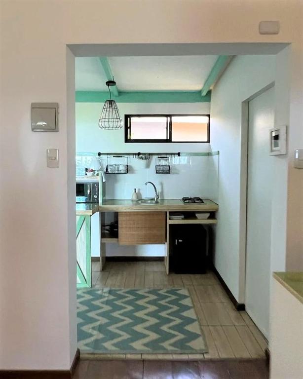 Kuchyň nebo kuchyňský kout v ubytování Hotel Boutique La Perouse