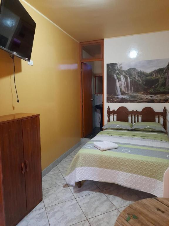 Postel nebo postele na pokoji v ubytování Nasca Trails B&B