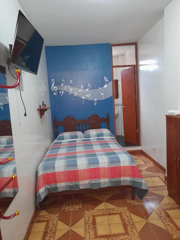 Postel nebo postele na pokoji v ubytování Nasca Trails B&B