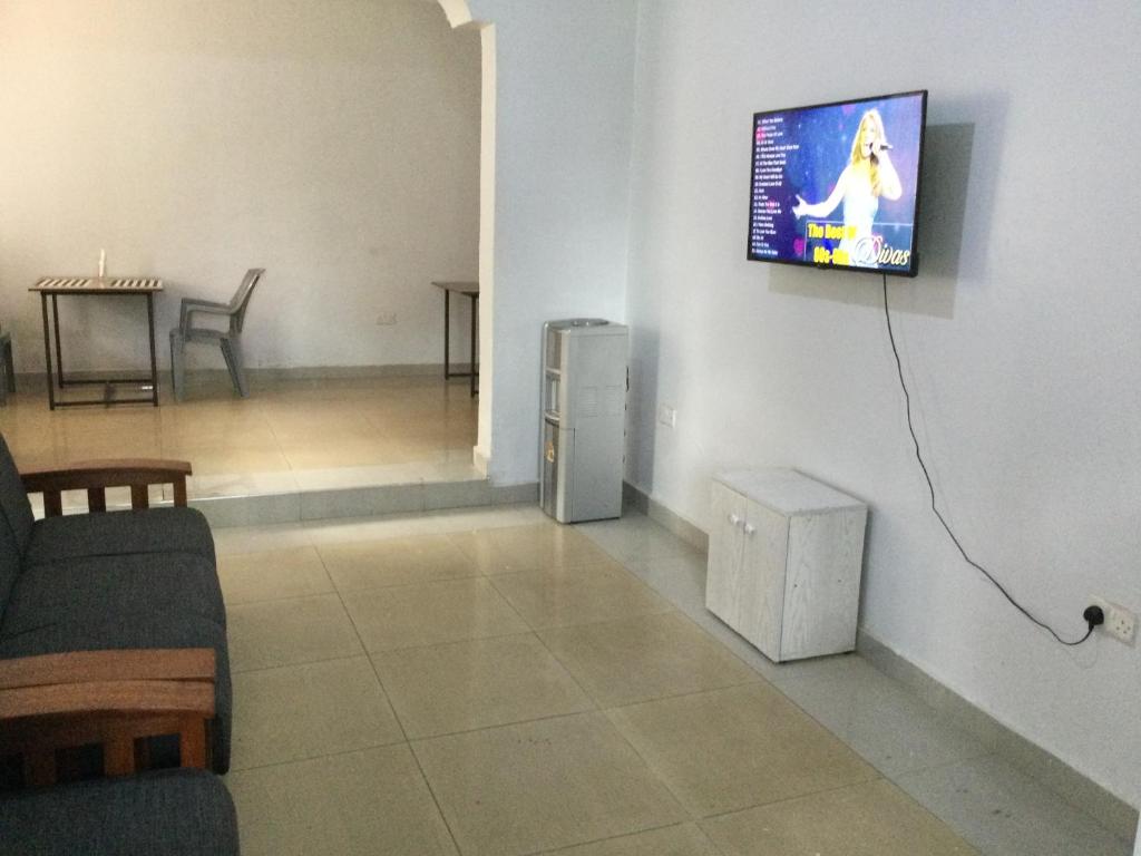 TV a/nebo společenská místnost v ubytování Milimani Comfort
