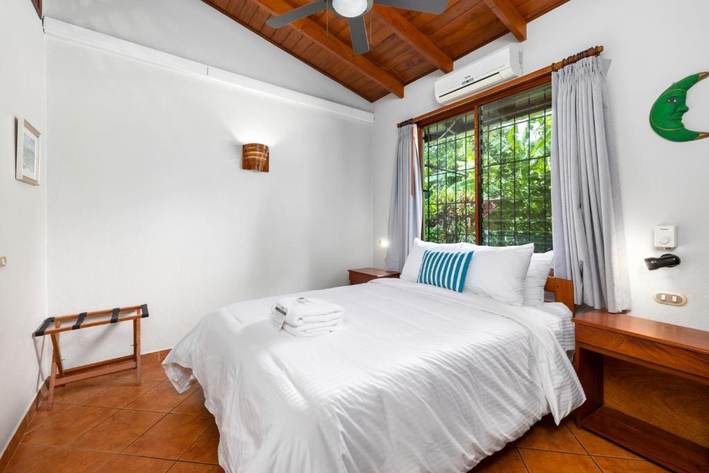Postel nebo postele na pokoji v ubytování Hotel Bahia Esmeralda