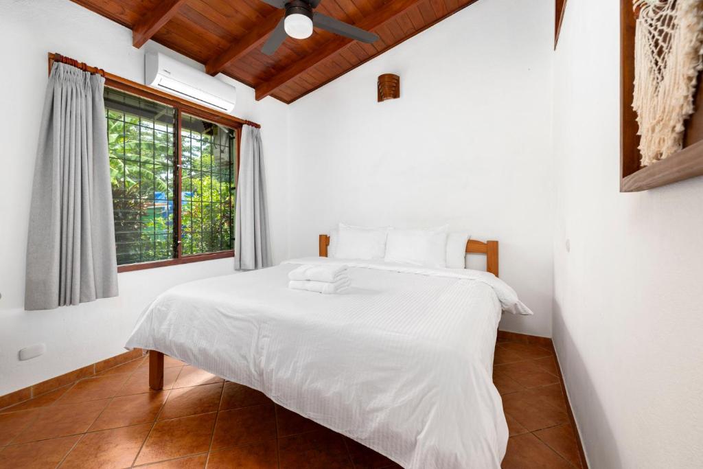 Postel nebo postele na pokoji v ubytování Hotel Bahia Esmeralda