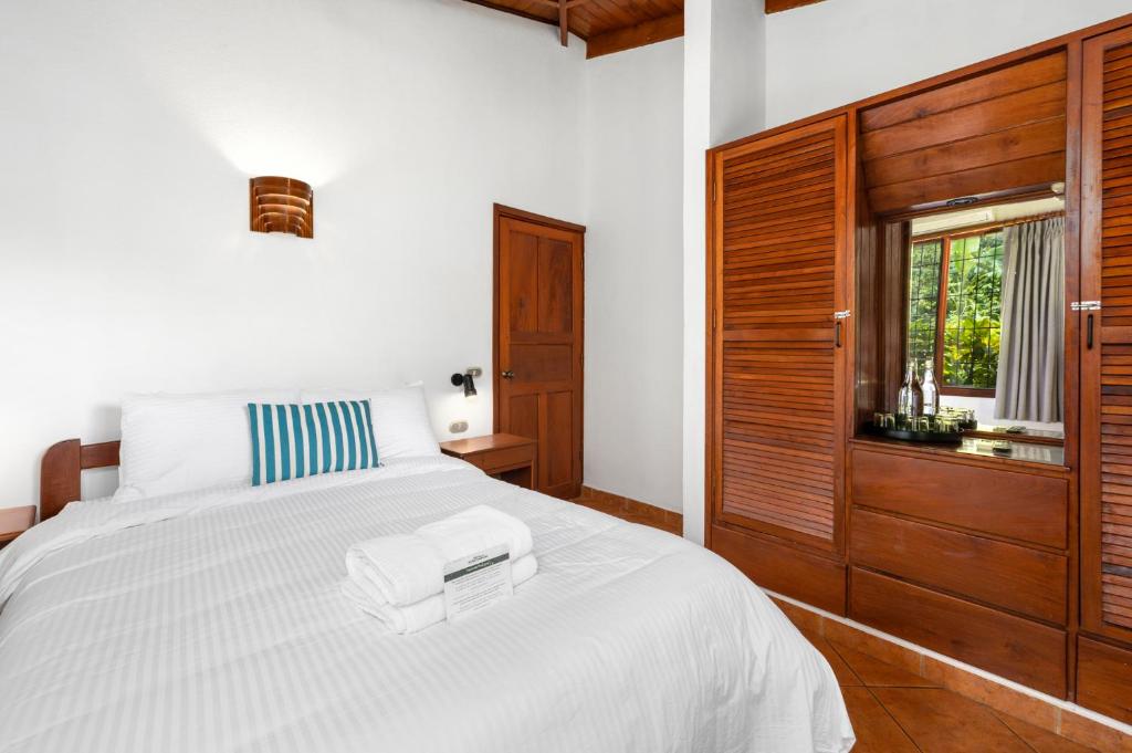Postel nebo postele na pokoji v ubytování Hotel Bahia Esmeralda
