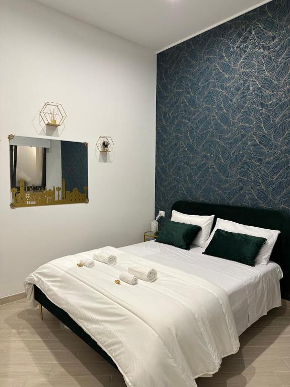 Un pat sau paturi într-o cameră la Del Carmine 23