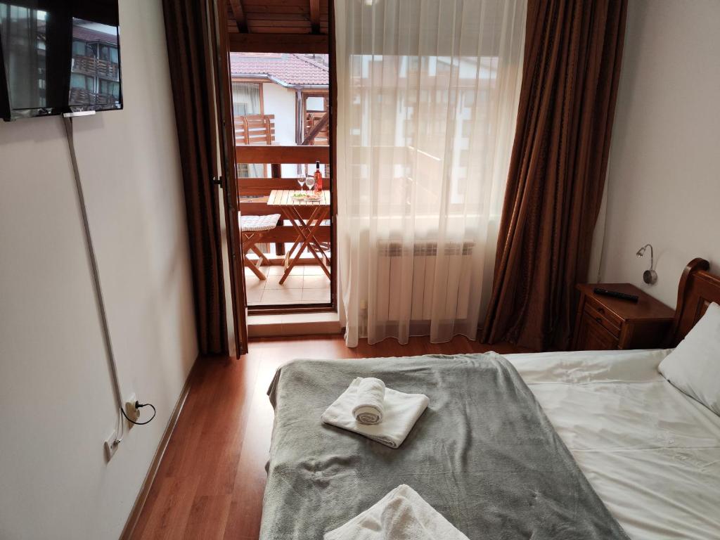Postel nebo postele na pokoji v ubytování Bansko Belvedere Apartament