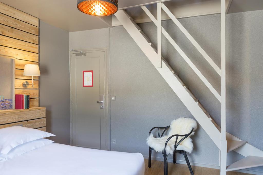 Postel nebo postele na pokoji v ubytování Hôtel de Russie