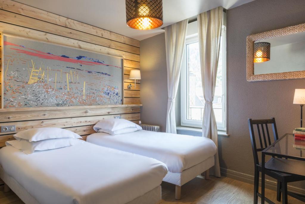 Postel nebo postele na pokoji v ubytování Hôtel de Russie