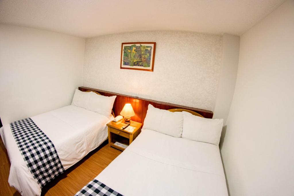 Postel nebo postele na pokoji v ubytování Hotel Don Saul