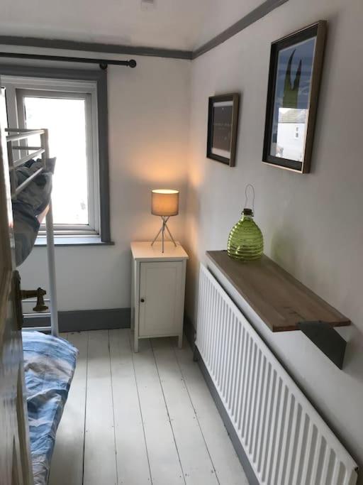 Postel nebo postele na pokoji v ubytování Whitstable Link