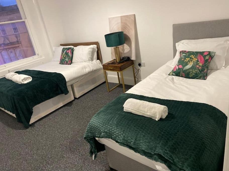 Postel nebo postele na pokoji v ubytování Bridgewater Flat