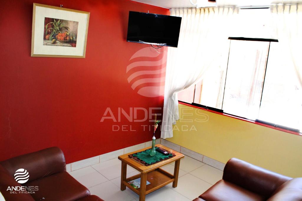 TV a/nebo společenská místnost v ubytování ANDENES DEL TITICACA