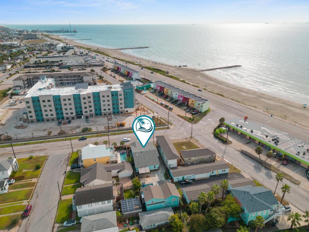an aerial view of a city and the beach at Serene Beachside Getaway - 77 Steps To The Ocean in Galveston