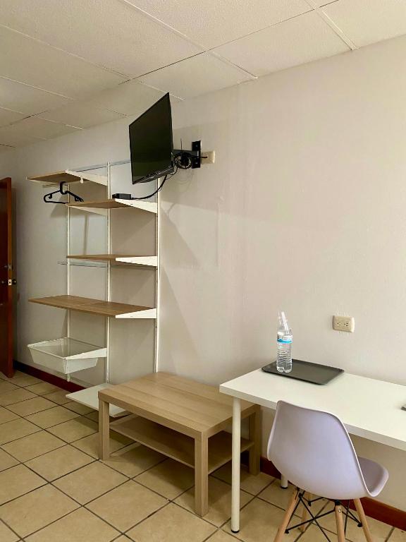 TV a/nebo společenská místnost v ubytování Posada Catalina