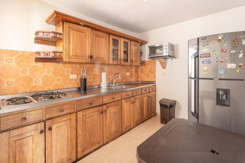 Kuchyň nebo kuchyňský kout v ubytování Letto Hostal