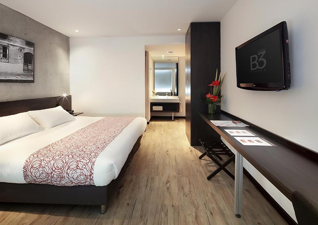 Postel nebo postele na pokoji v ubytování Hotel B3 Virrey