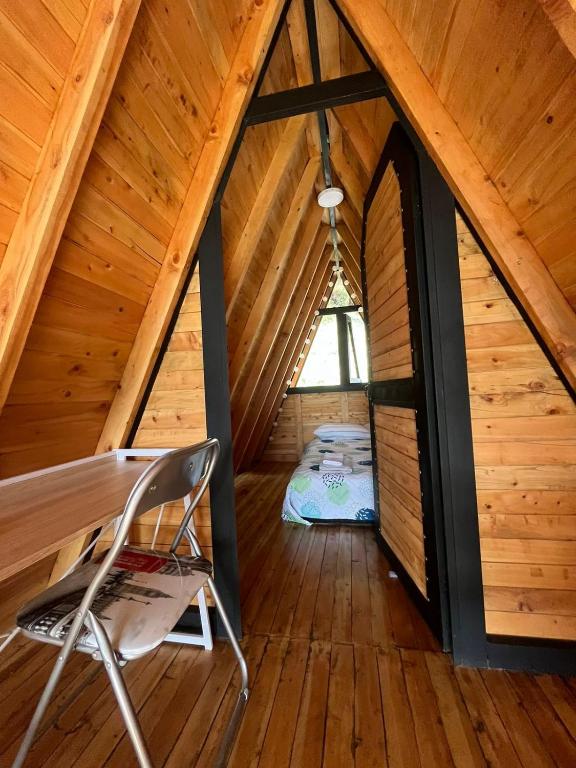 Postel nebo postele na pokoji v ubytování Cabaña Starka & Jacuzzi