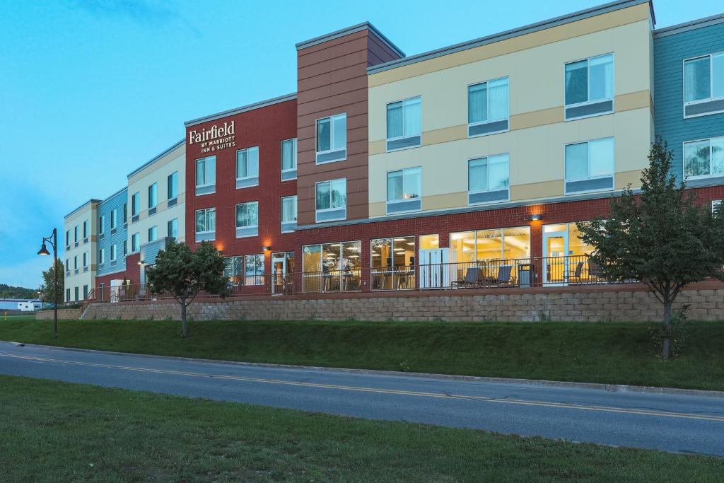 a rendering of a hotel with a building at Fairfield Inn & Suites Marquette in Marquette