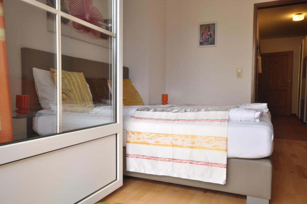 Posteľ alebo postele v izbe v ubytovaní Appartements Peter