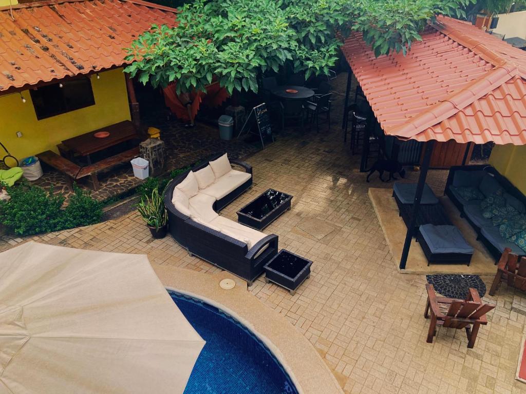Patio nebo venkovní prostory v ubytování Tamarindo Backpackers