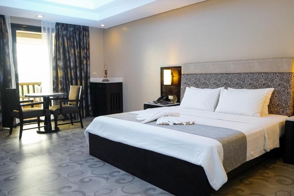 Postel nebo postele na pokoji v ubytování Coron Westown Resort