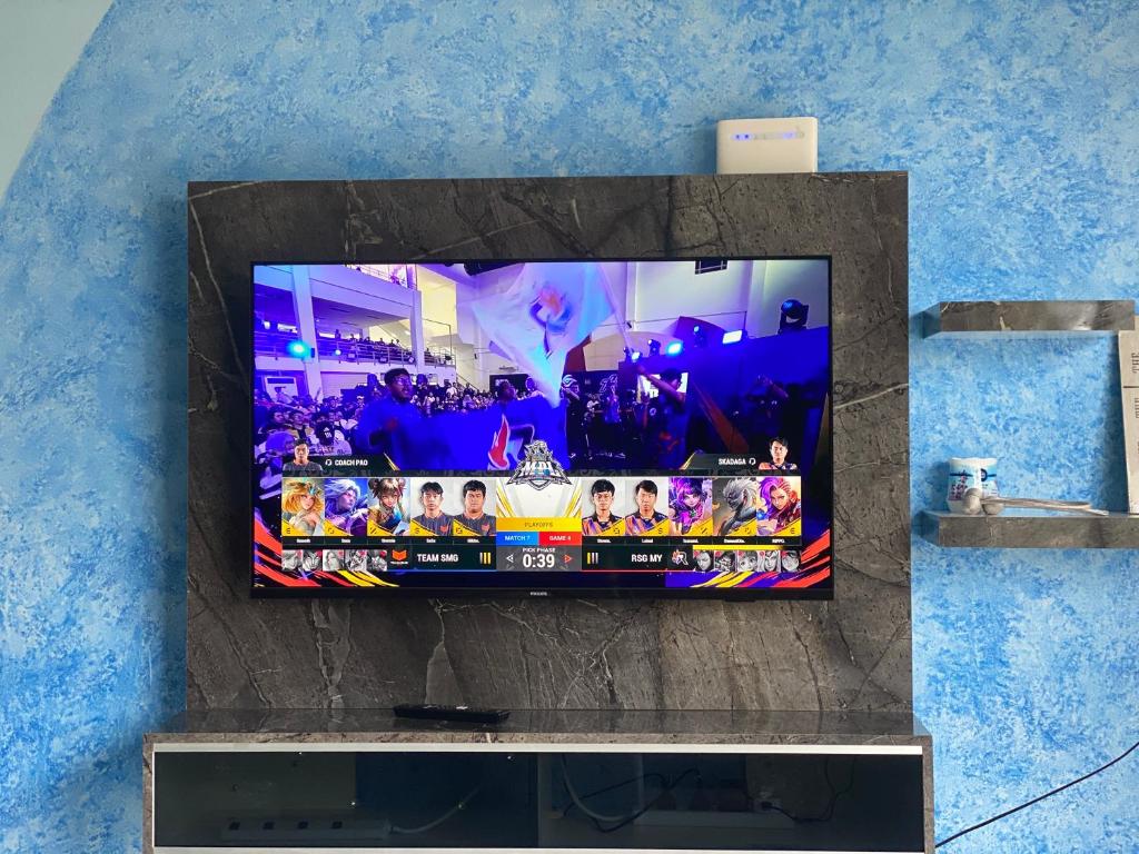 TV a/nebo společenská místnost v ubytování Marina View Villas Pinnacle Guest House