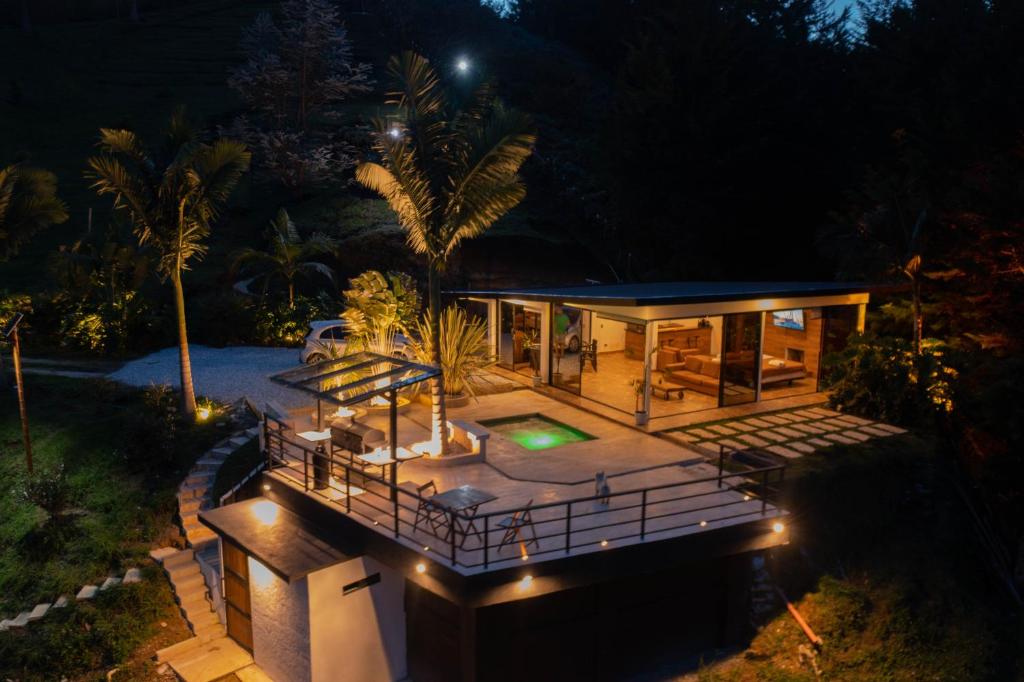 an aerial view of a house at night at Laze Lake Guatape in El Peñol