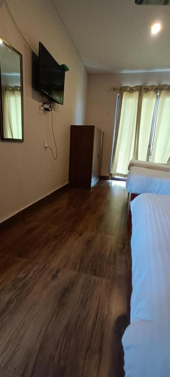 Sjónvarps- og/eða afþreyingartæki á Hotel Dolly