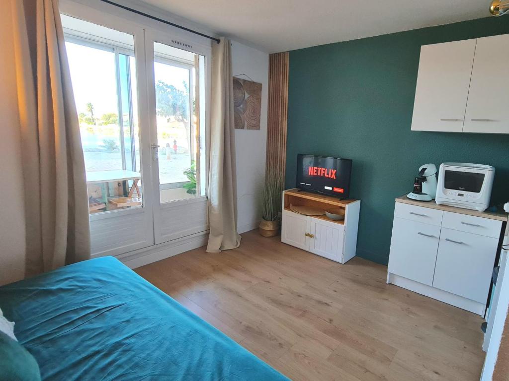 Kuchyňa alebo kuchynka v ubytovaní Splendide appartement GOLDEN HOUSE vue LAC et montagne