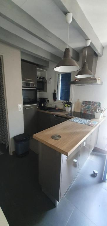 Kuchyň nebo kuchyňský kout v ubytování Maison à Quiberon