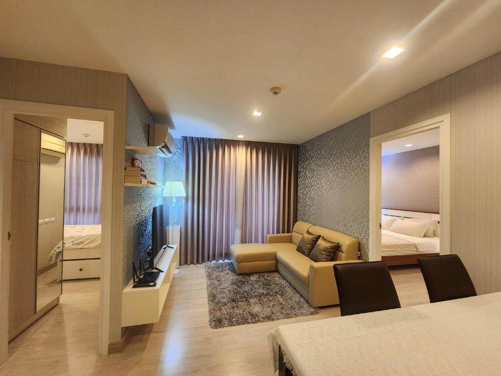 Postel nebo postele na pokoji v ubytování Family Suit 2 Bedrooms 2 Bathrooms in Chiang Mai
