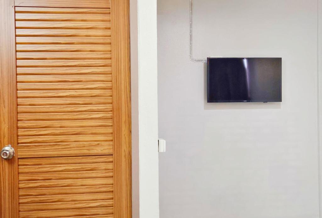 TV a/nebo společenská místnost v ubytování Pacific Residence